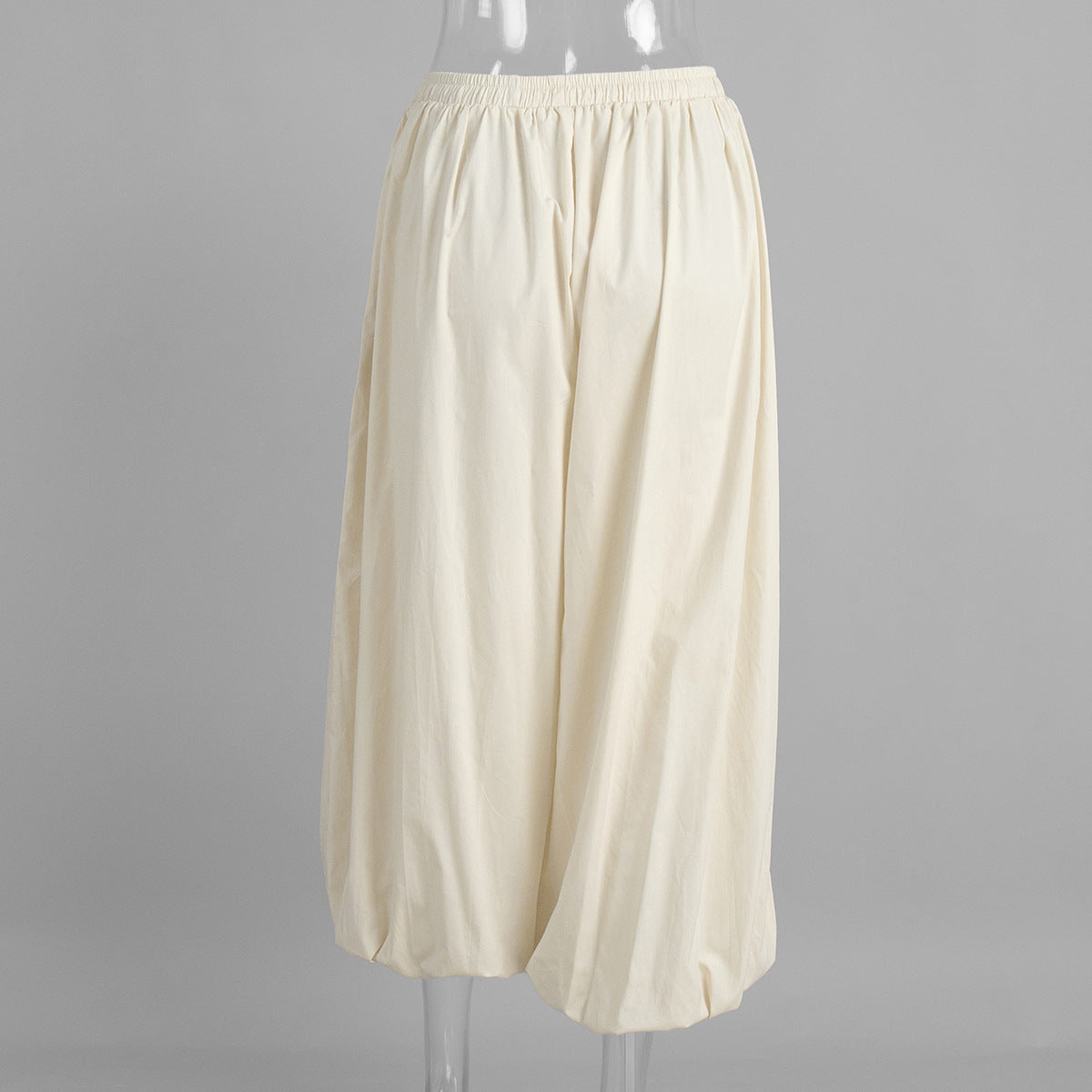 Cotton Balloon Lantern Pants in Apricot Cream — front view on mannequin