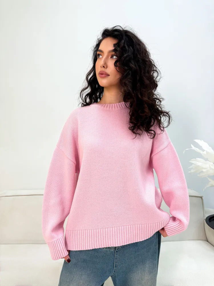Relaxed Crew-Neck Knit Sweater in Pink — front view on model