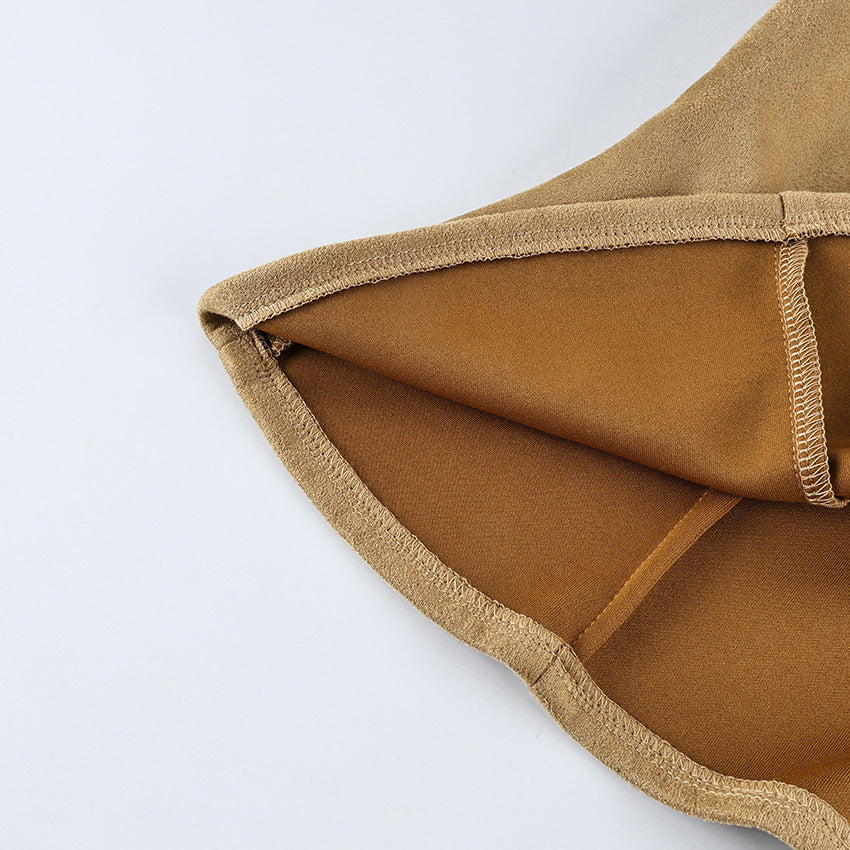 Fitted Faux Suede Zip Jacket with Peplum Hem in Camel — close-up of the lined hem