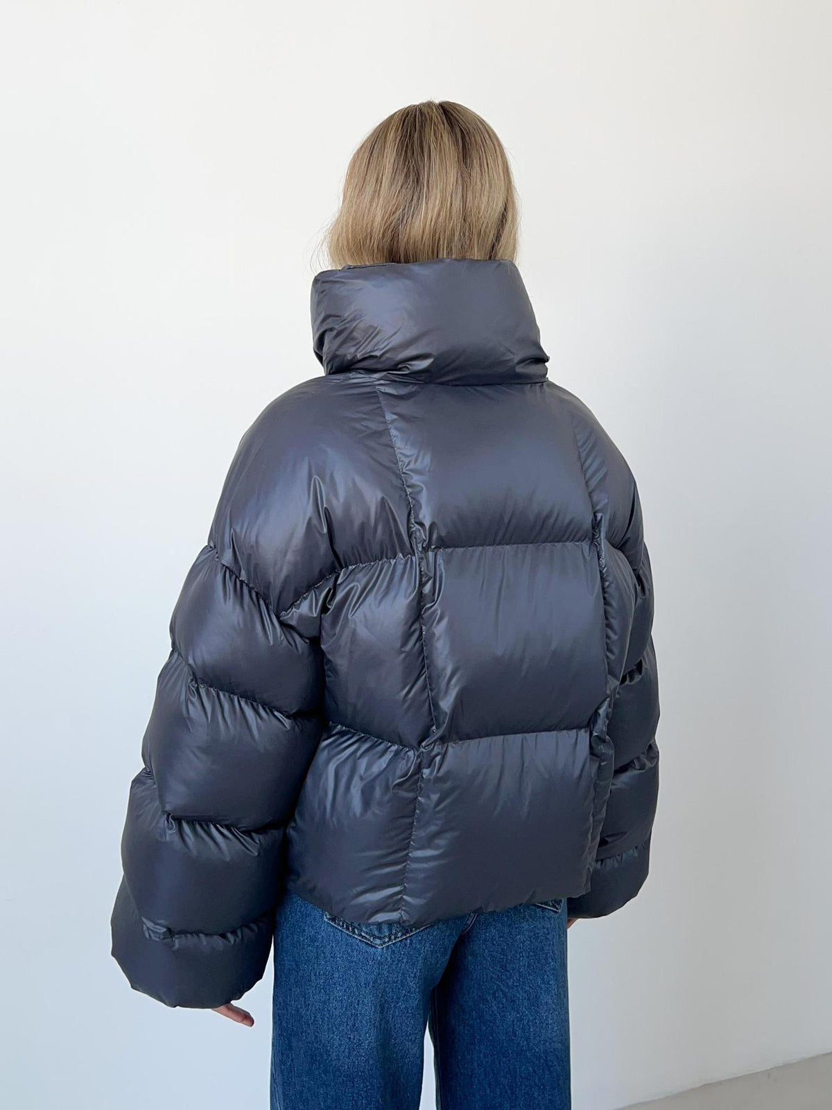 Cropped Hooded Puffer Jacket with Drawstring Hem in Slate Gray — back view on model