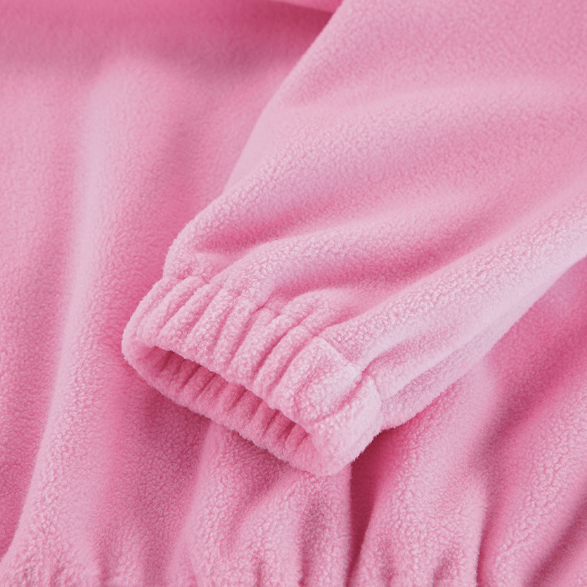Relaxed Half-Zip Fleece Pullover with Elastic Hem in Pink — close-up of the elasticated cuff
