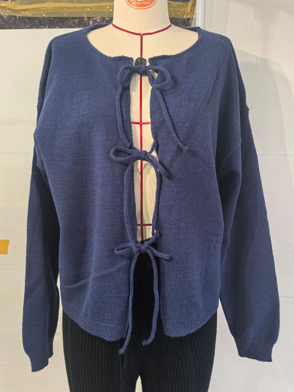 Round Neck Tie-Front Knit Cardigan in Navy — front view on mannequin
