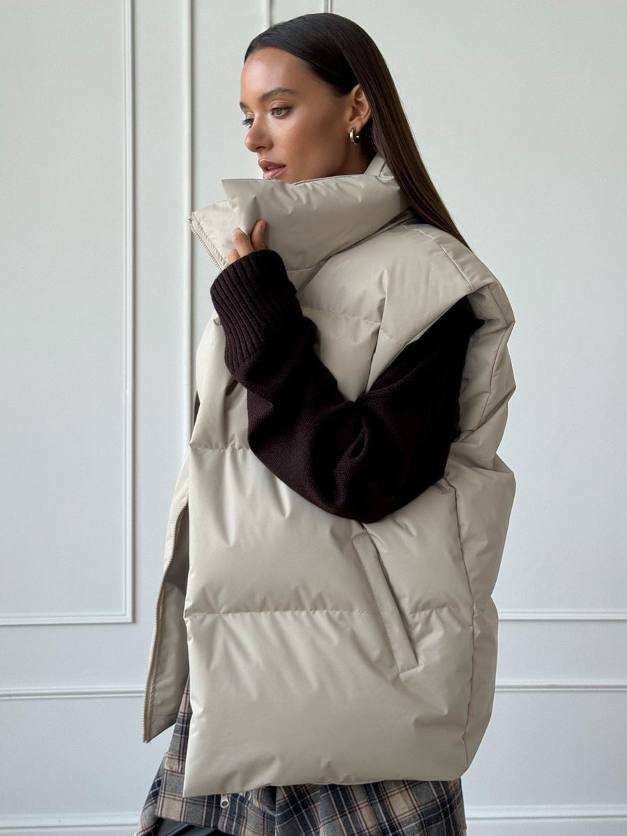 Longline Puffer Vest with High Stand Collar in Cream — side view on model