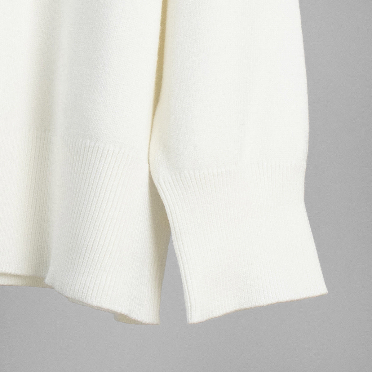 Slouchy Oversized Crew Neck Sweater in Ivory — close-up of the ribbed cuff