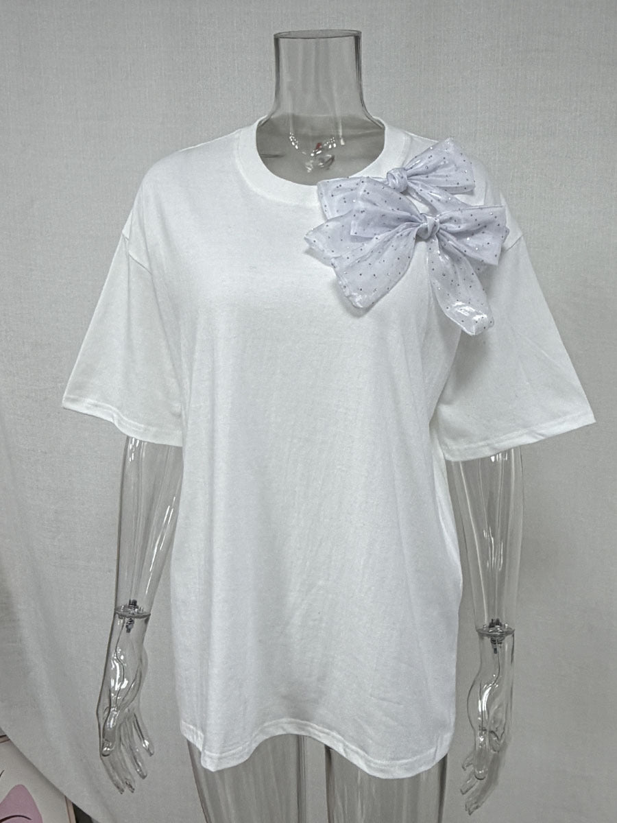 Oversized Cotton Tee with a Rhinestone Bow in White — front view on mannequin