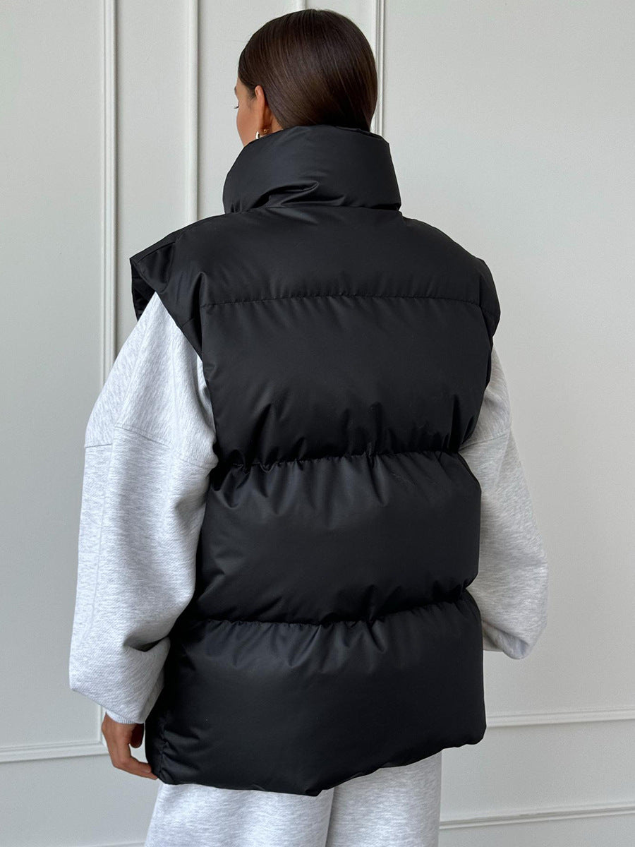 Longline Puffer Vest with High Stand Collar in Black — back view on model