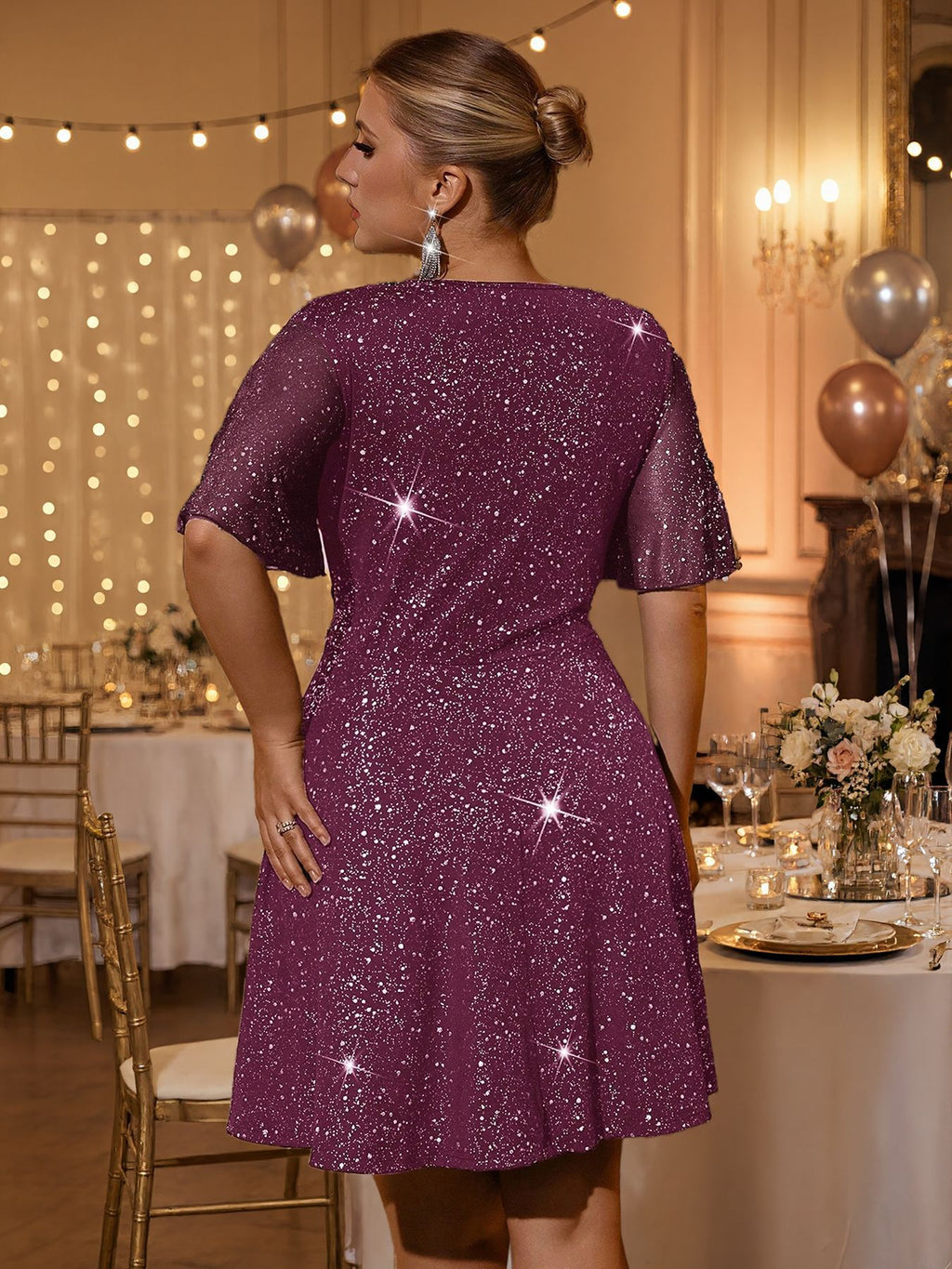 Plus-Size Glitter Wrap-Front Party Dress with Flutter Sleeves in Plum — back view on model