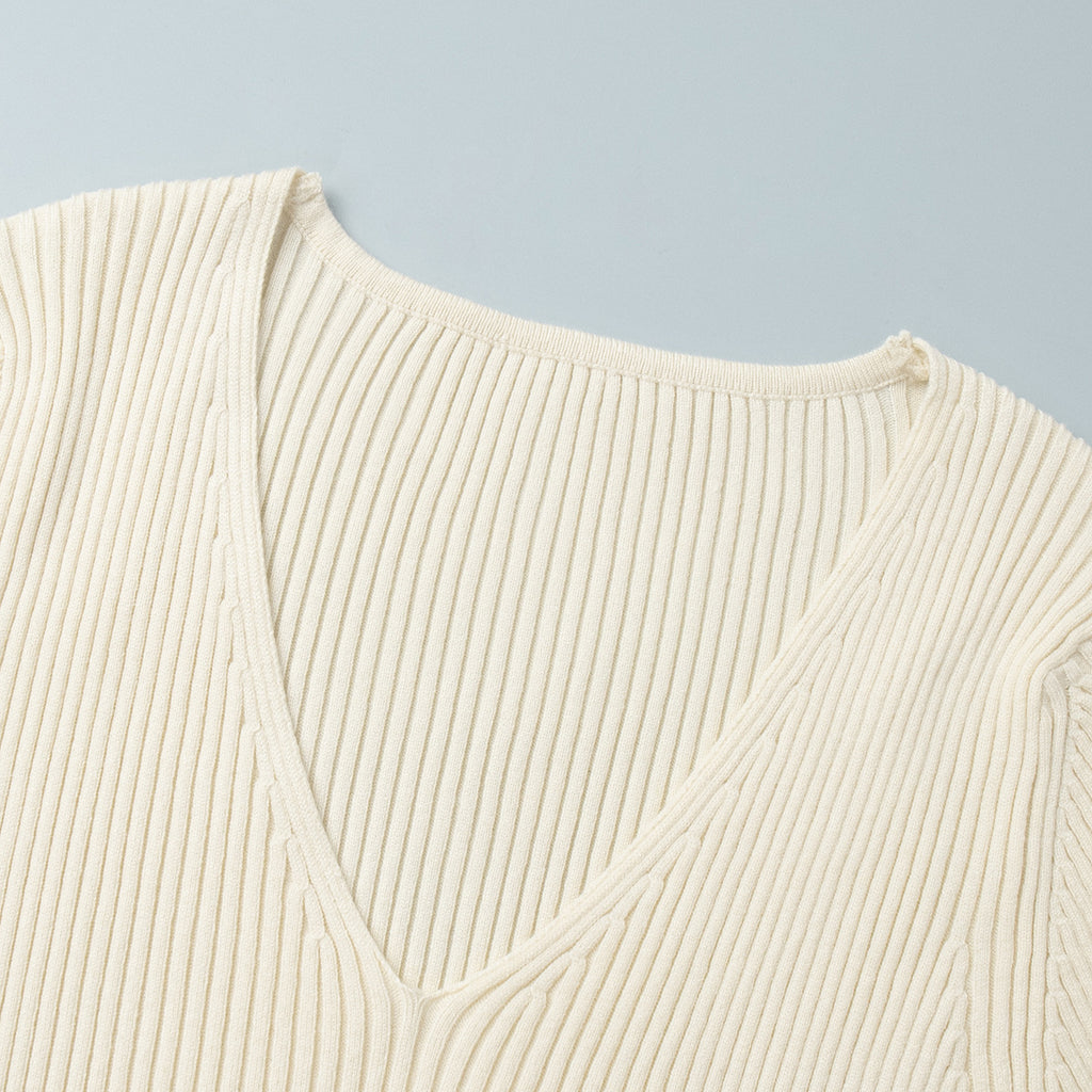 Ribbed Knit V-Neck Long Sleeve Maxi Dress in Cream — close-up of V-neckline