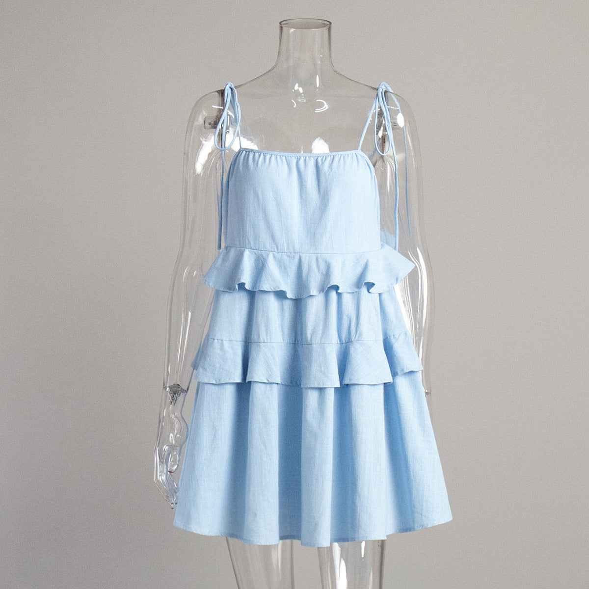 Tiered Ruffle Tie-Strap Mini Dress in Light Blue — front view on mannequin