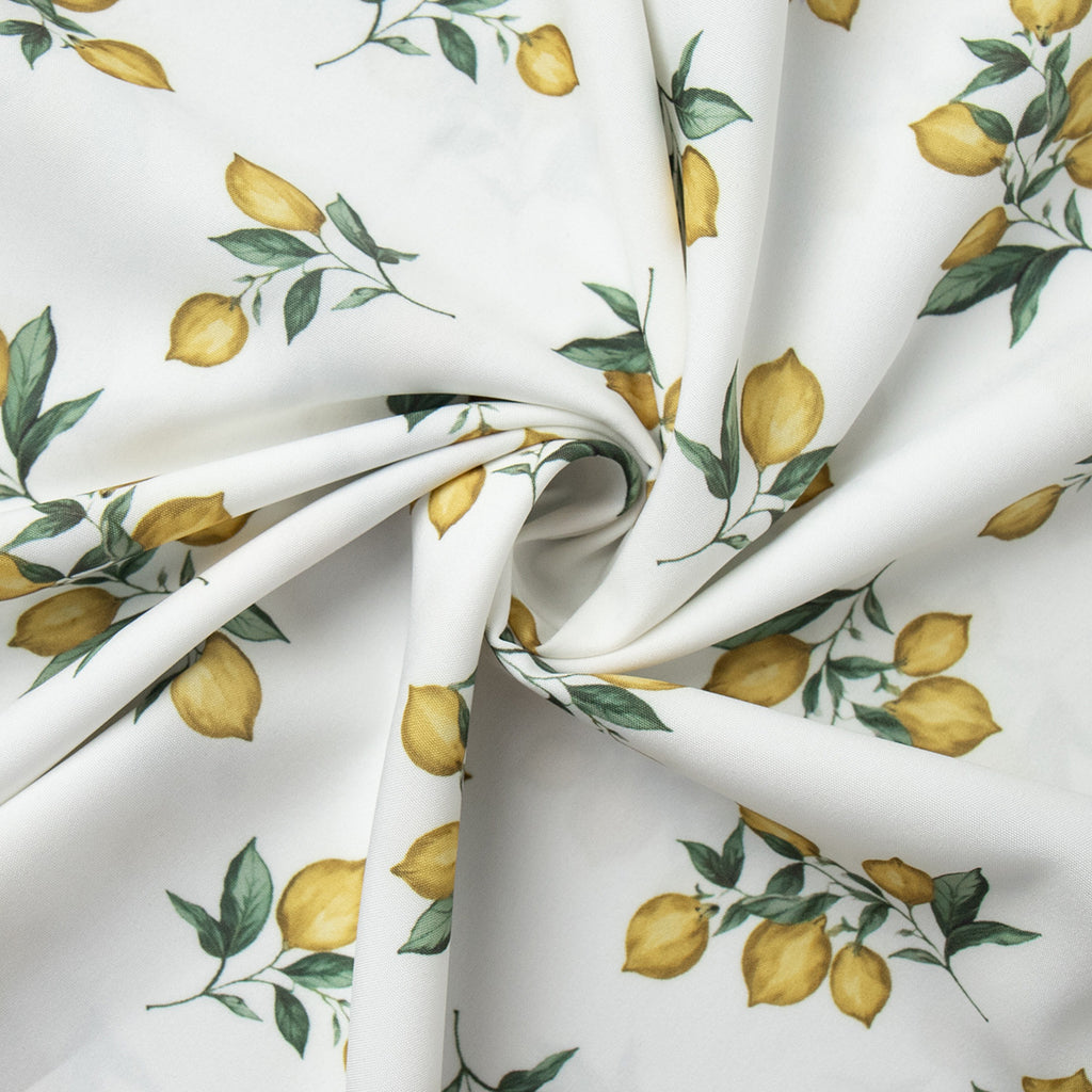 Printed Tie-Strap Maxi Dress with Side Slit in Lemon Print — close-up of the ruffled bust
