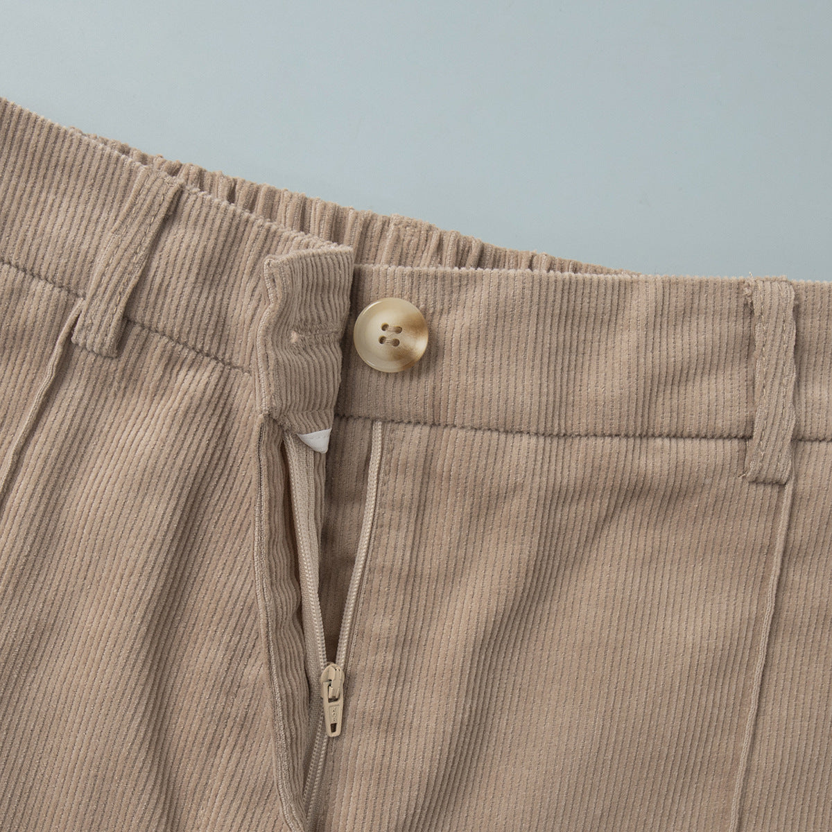 Cotton Corduroy Wide-Leg Pants with Pintuck Front in Light Khaki — close-up of the zip fly