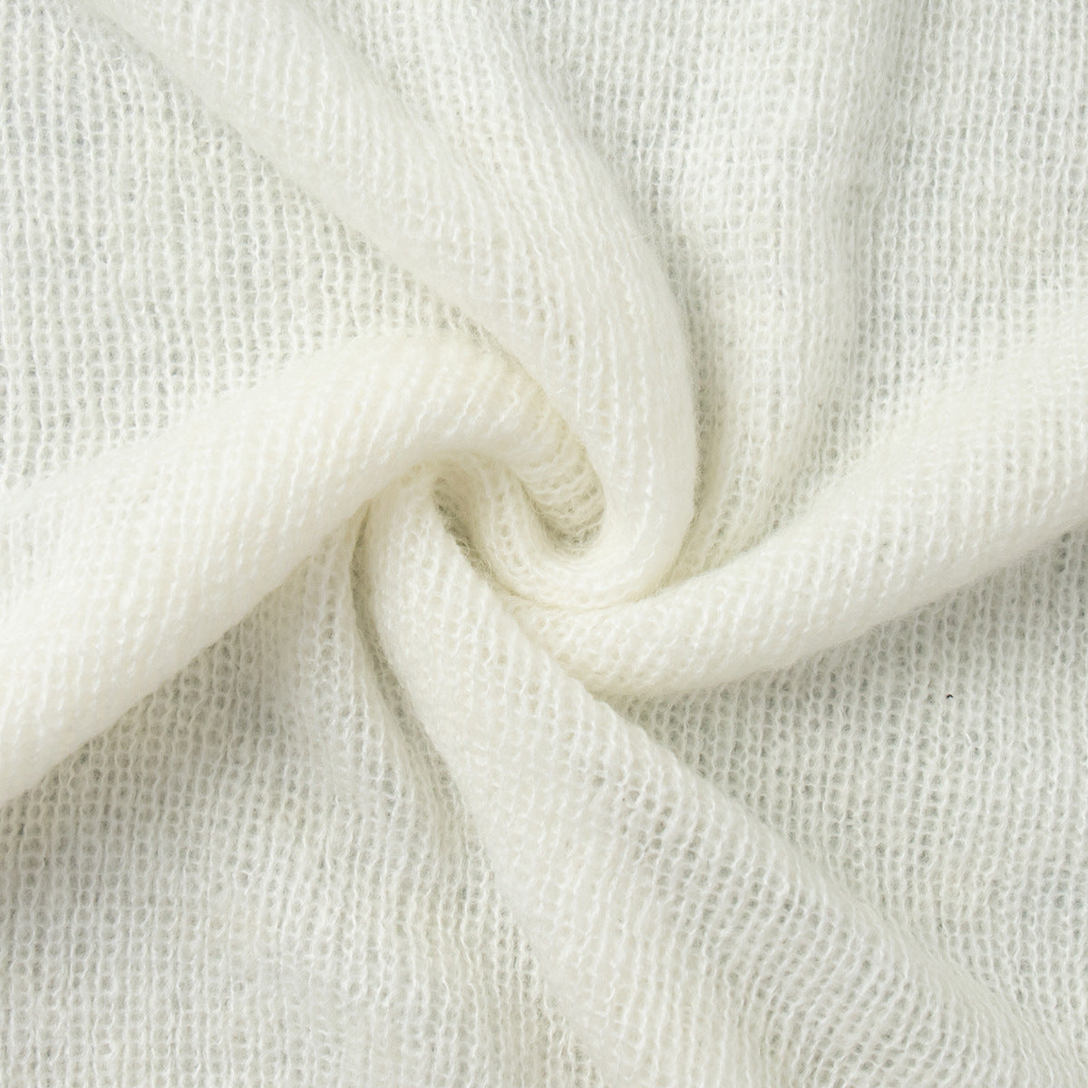 Airy Knit Long Cardigan & Sleeveless Maxi Dress Set in Ivory — close-up of the airy knit