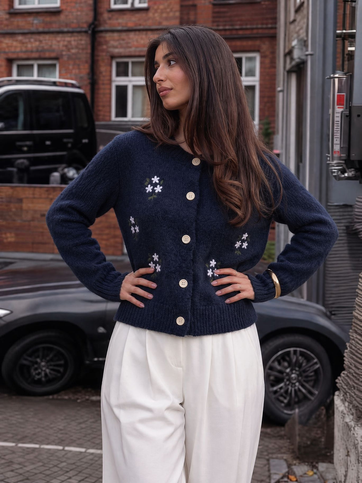 Floral Embroidered Button Cardigan in Navy — on model with white trousers