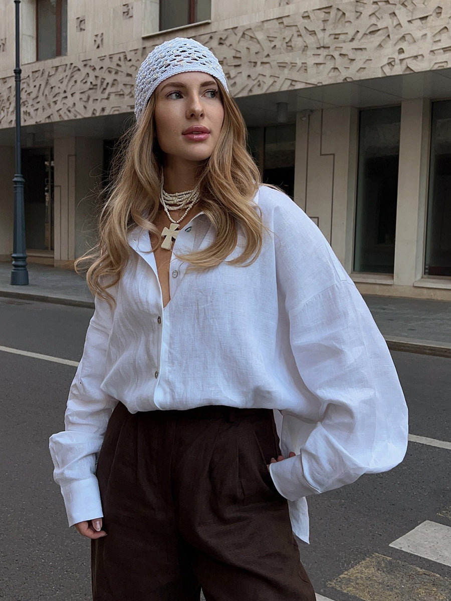 Relaxed Cotton Button-Down Shirt in White — on model with trousers