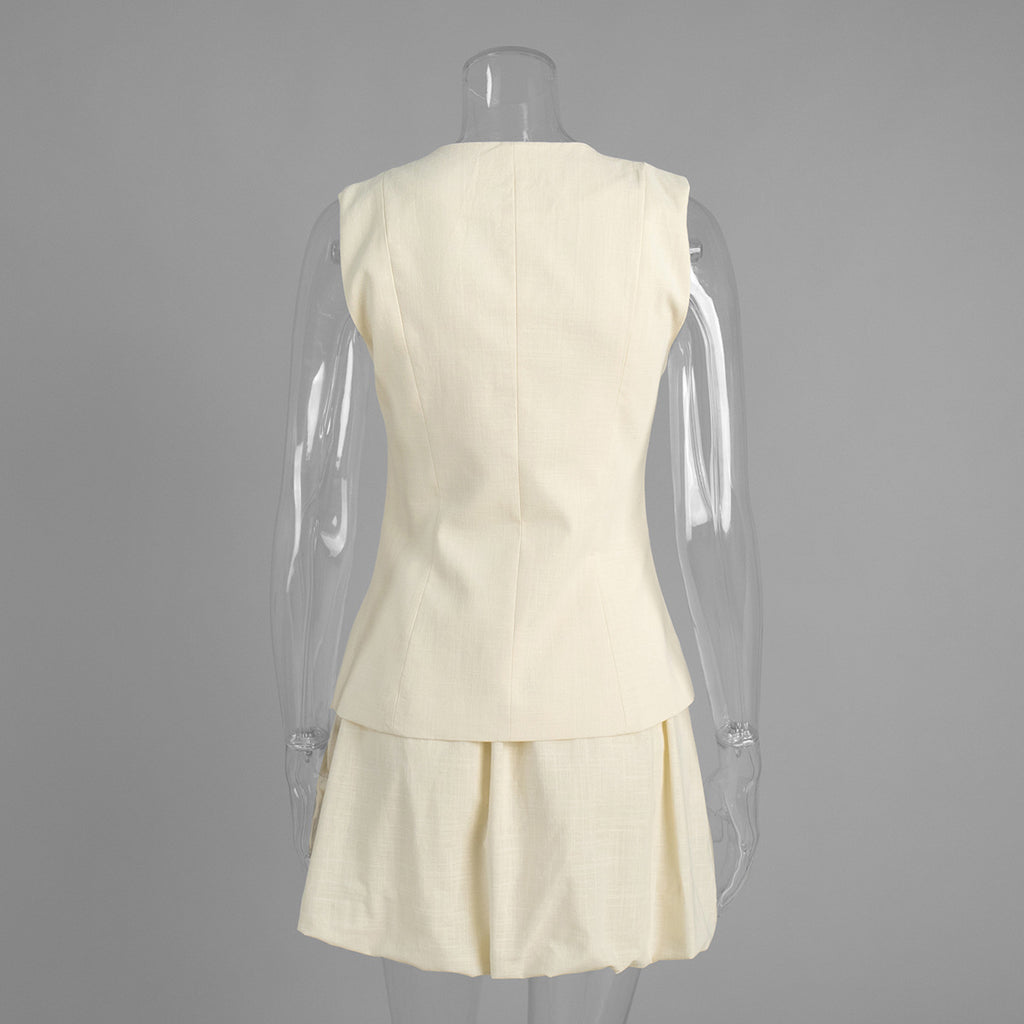 Cotton Peplum Vest & Bubble Mini Skirt Set in Apricot — set on mannequin