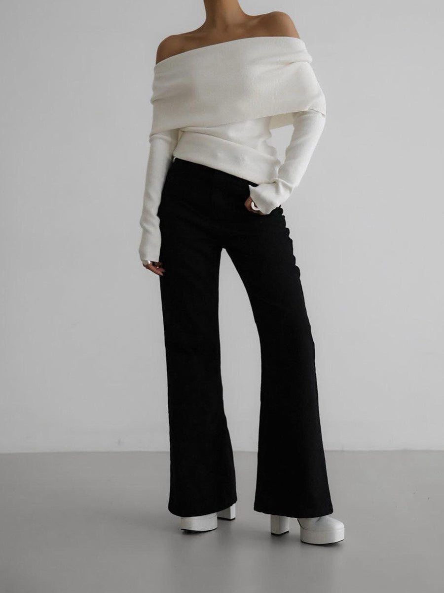 Off-Shoulder Fold-Over Knit Sweater in Ivory — full-length view with black flared trousers