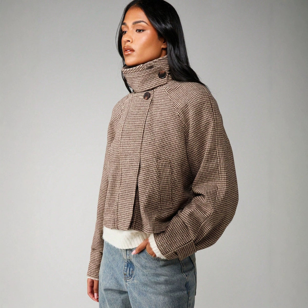 Cropped Houndstooth Jacket with Buttoned High Collar in Brown Houndstooth — front view on model, collar buttoned