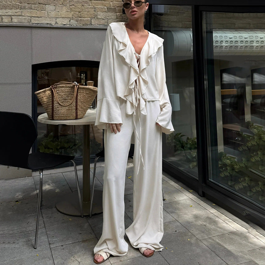 Ruffle Tie-Front Blouse and Wide-Leg Pants Set in Cream — front view on model