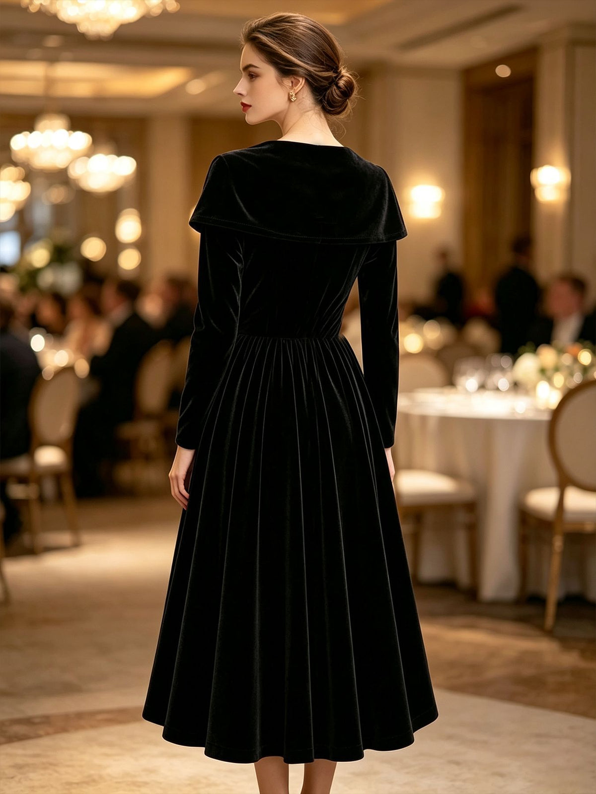 Velvet Midi Dress with Portrait Collar and Rhinestone Brooch in Black — back view on model