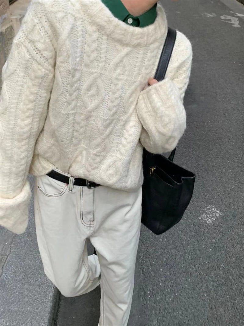 Chunky Cable-Knit Crew-Neck Sweater in Ivory — on model