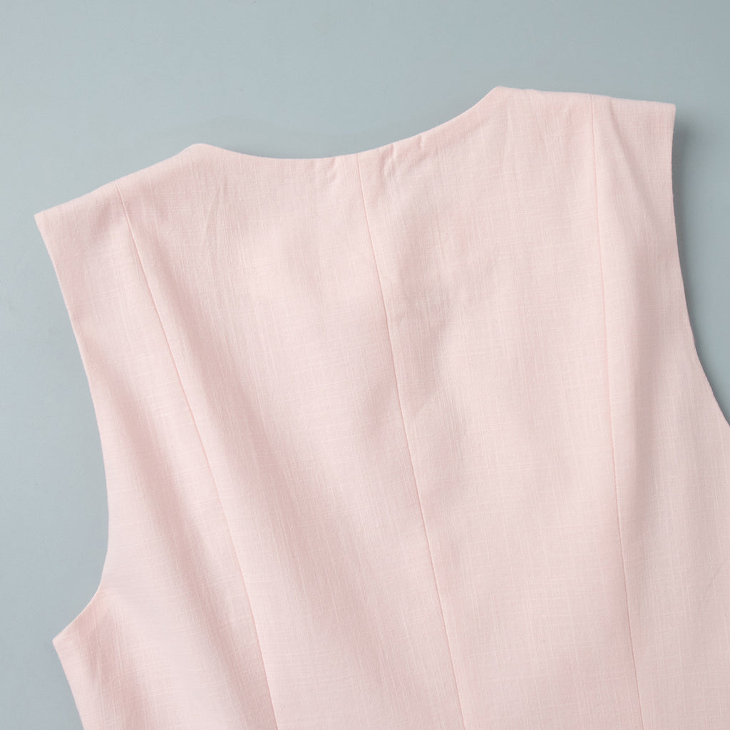 Cotton Peplum Vest & Bubble Mini Skirt Set in Soft Pink — close-up of the peplum hem