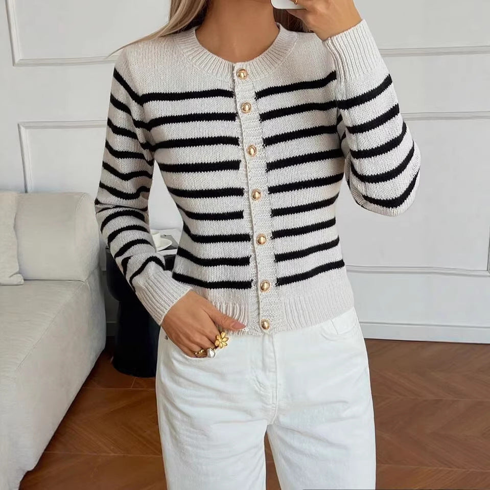 Striped Crew-Neck Cardigan with Gold Buttons in Cream & Black — on model with white trousers