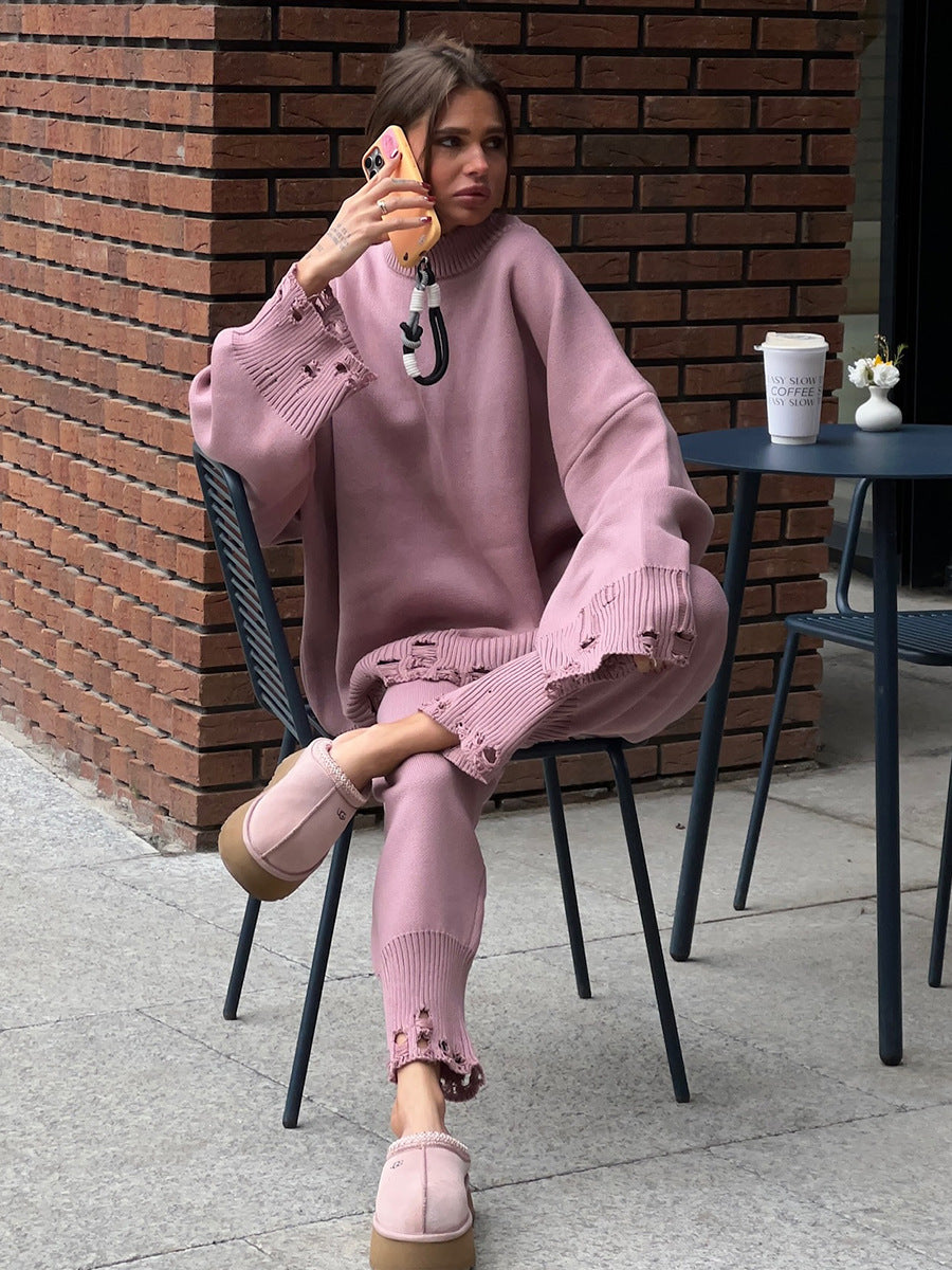 Distressed-Hem Oversized Knit Sweater & Jogger Set in Dusty Rose — seated view on model
