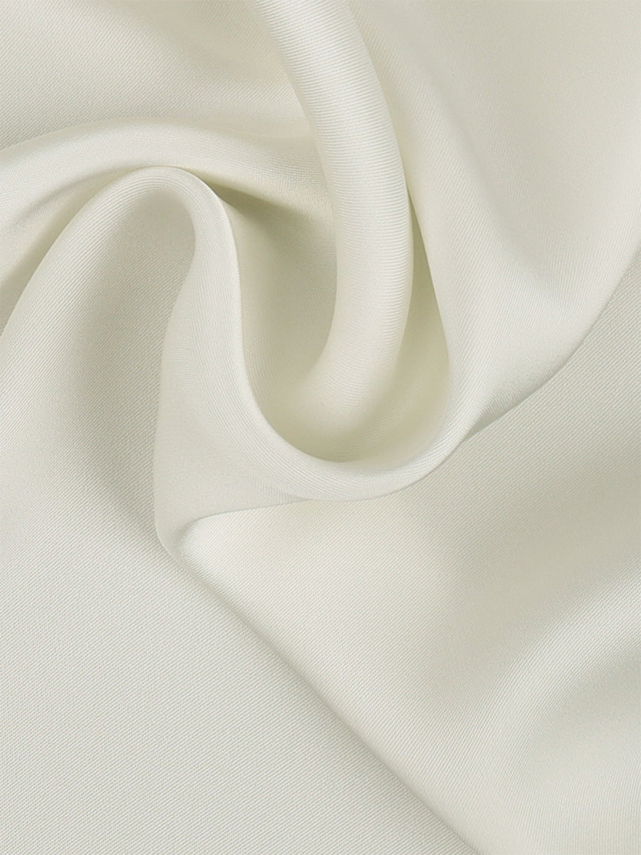 Satin Lace-Trim Mini Slip Dress with Tie Back in Ivory — close-up of the satin fabric