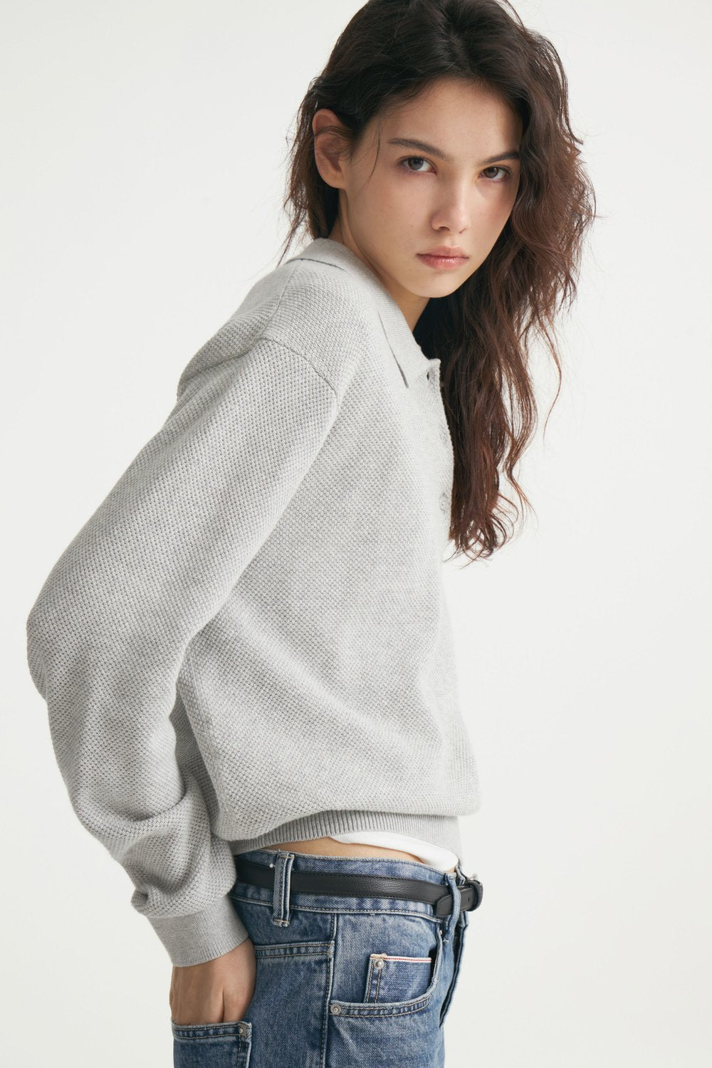 Relaxed Polo Collar Knit Sweater in Light Heather Gray — side view on model