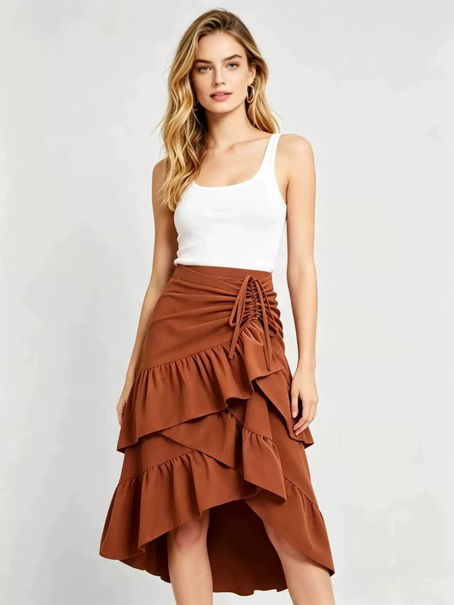 Tiered Ruffle High-Low Midi Skirt with Drawstring Ruching in Caramel — on model, front