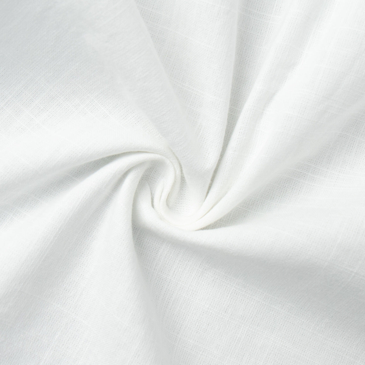 Tie-Front Cotton Mini Shirt Dress in White — close-up of the cotton weave