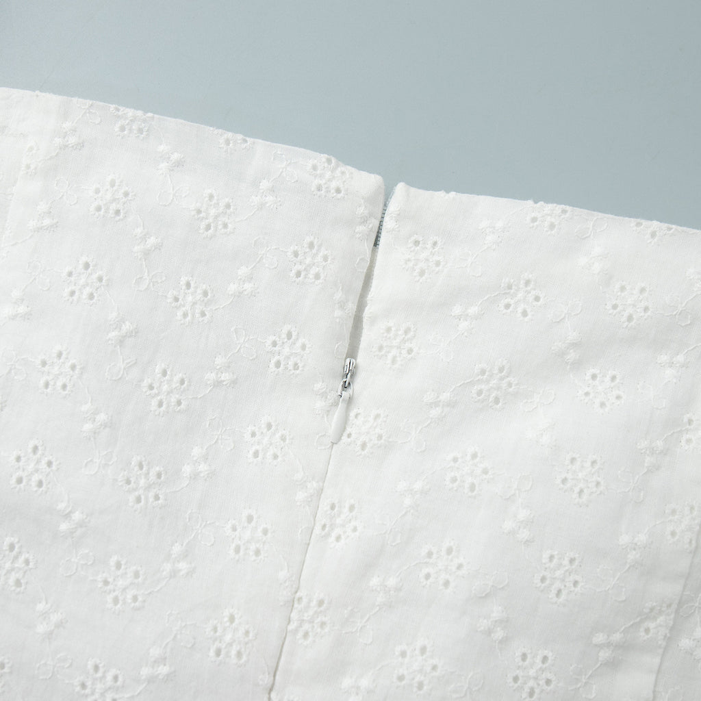 Eyelet Cotton Off-Shoulder Midi Dress in Ivory Eyelet — close-up of back zipper