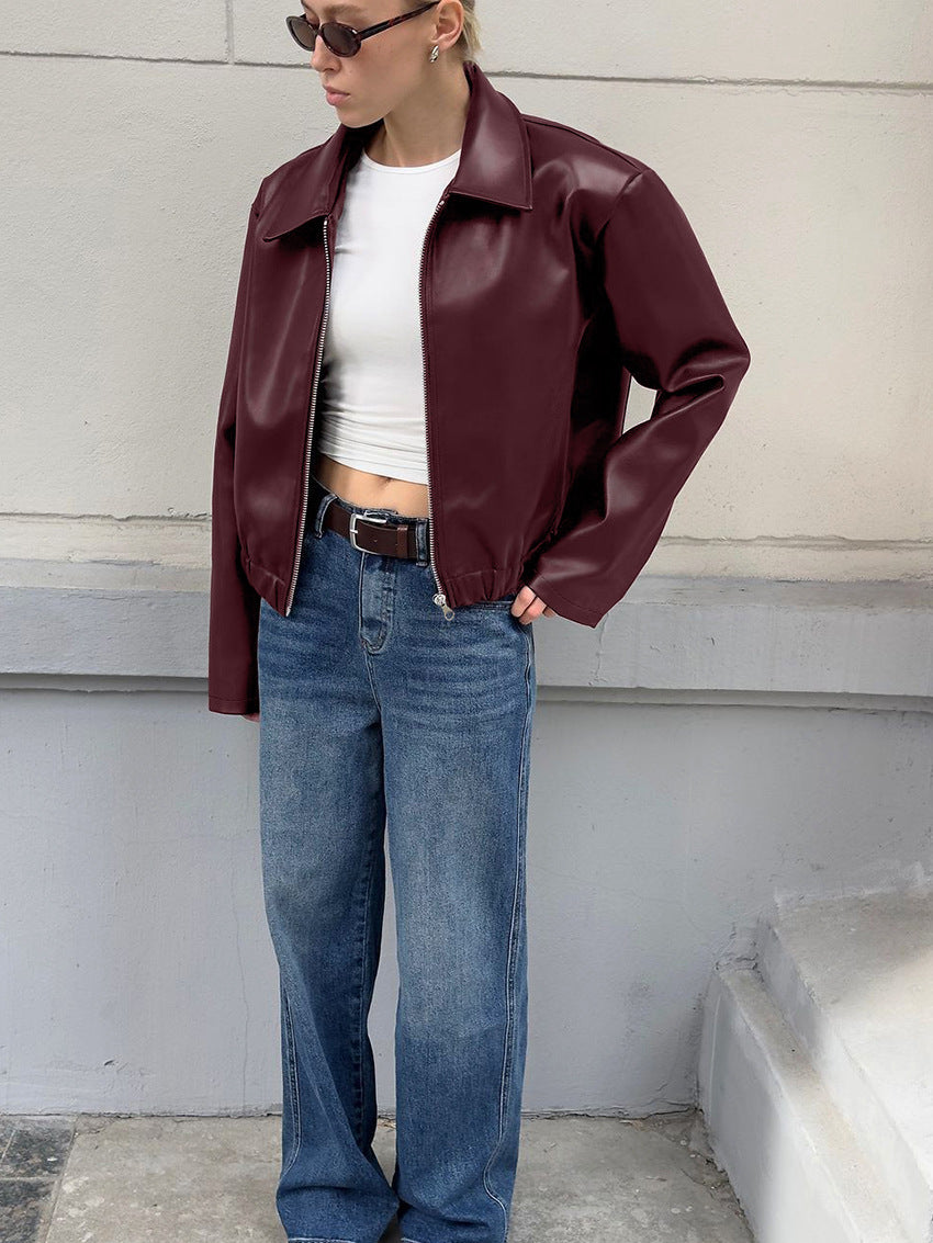 Faux Leather Bomber Jacket with Point Collar in Burgundy — front view on model with jeans