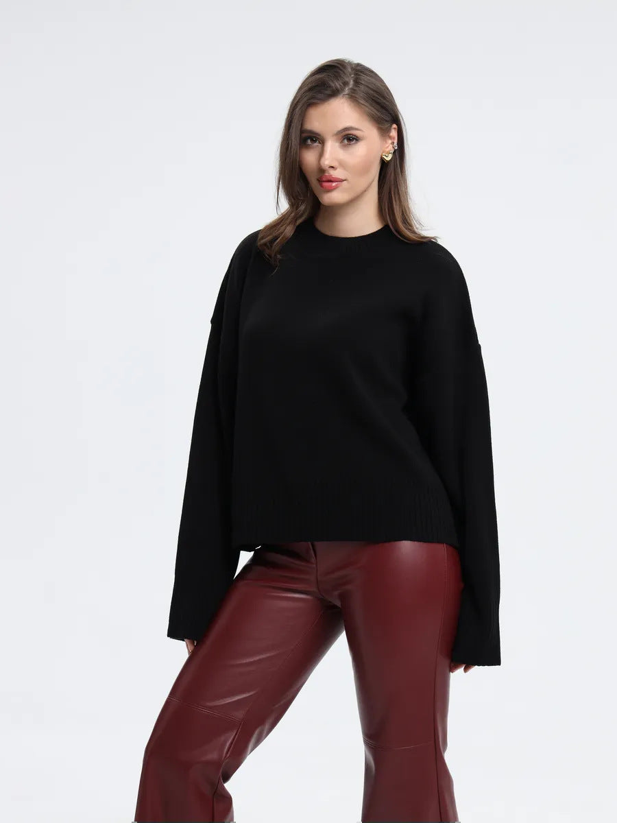 Relaxed Crew Neck Sweater with Split Cuffs in Black — front view on model or garment