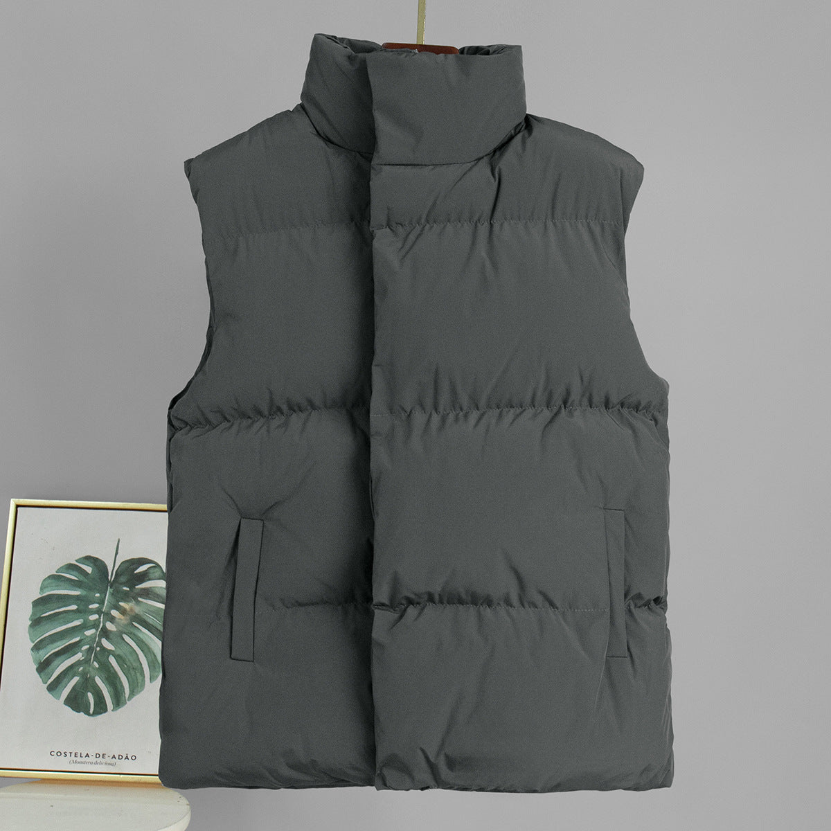 Longline Puffer Vest with High Stand Collar in Charcoal Gray — front view