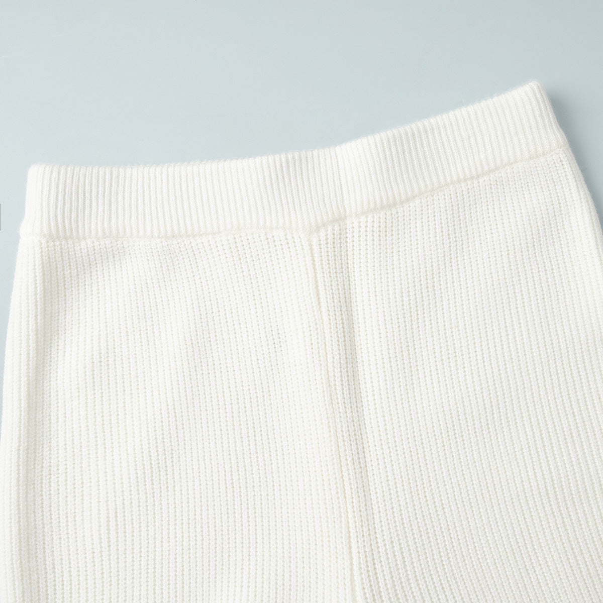 Half-Zip Polo Knit Sweater & Wide-Leg Pants Set in Ivory — close-up of the pants waistband