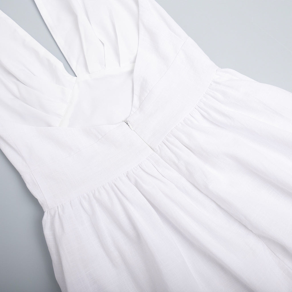 Cotton Halter V-Neck Maxi Dress in White — close-up of the V-neck