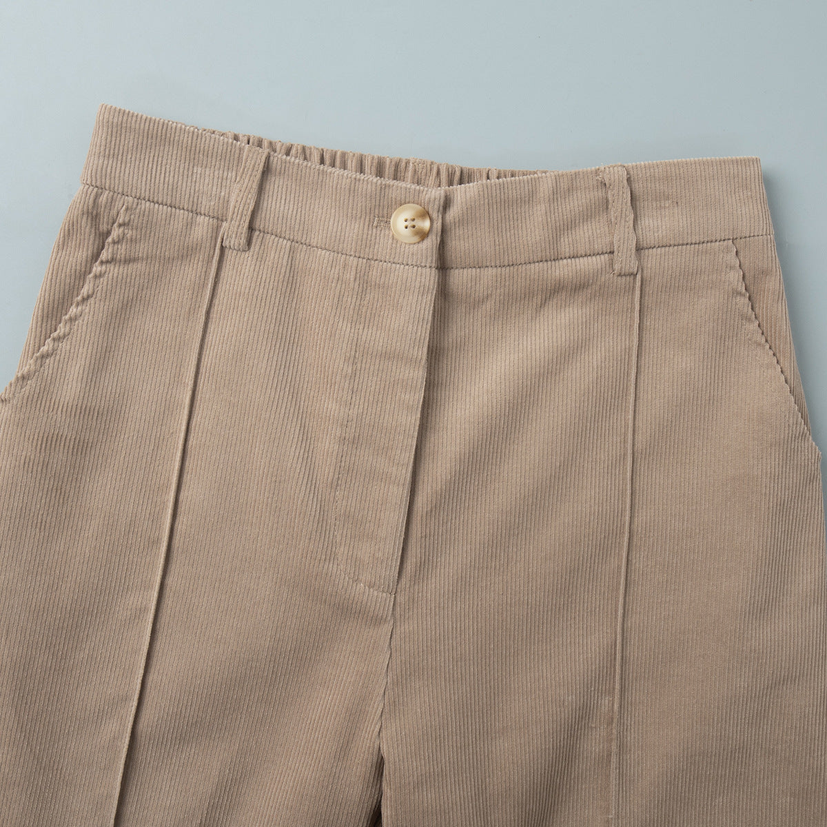 Cotton Corduroy Wide-Leg Pants with Pintuck Front in Light Khaki — close-up of the front waistband and pintuck