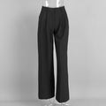 Pleated Wide-Leg Trousers in Black — front view on mannequin
