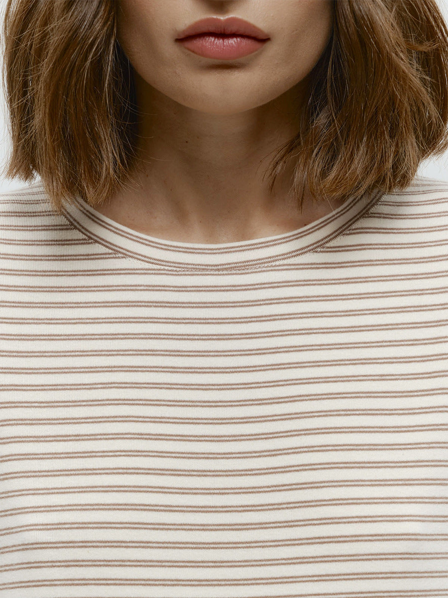 Striped Cotton Crew Neck Long Sleeve Tee in Oat Stripe — close-up of the crew neck and stripes