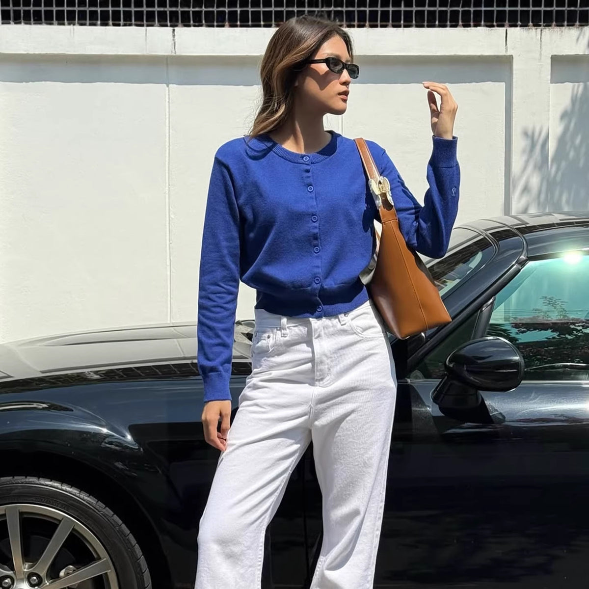 Cropped Crew-Neck Button Cardigan in Royal Blue — full-length view on model with white jeans