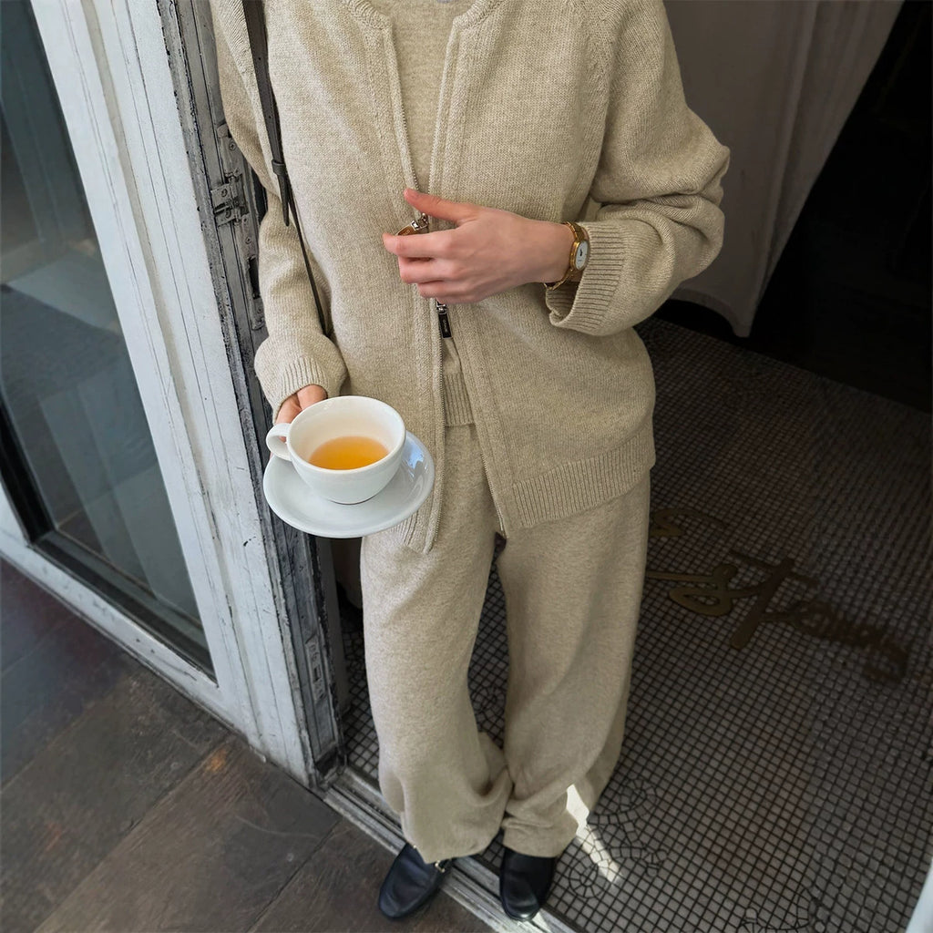 Three-Piece Knit Set: Zip-Up Cardigan, Sleeveless Top & Wide-Leg Pants in Oat — cardigan and pants on model