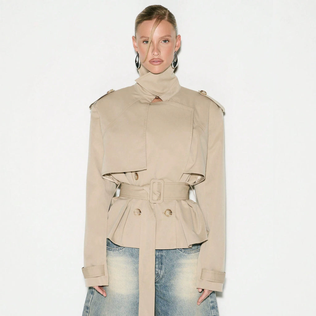 Cropped Double-Breasted Trench Jacket with Belt and Epaulettes in Khaki — front view on model, buttoned and belted with the collar up