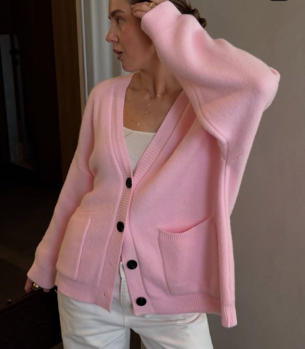 Oversized V-Neck Button Cardigan with Pockets in Pink — close view on model