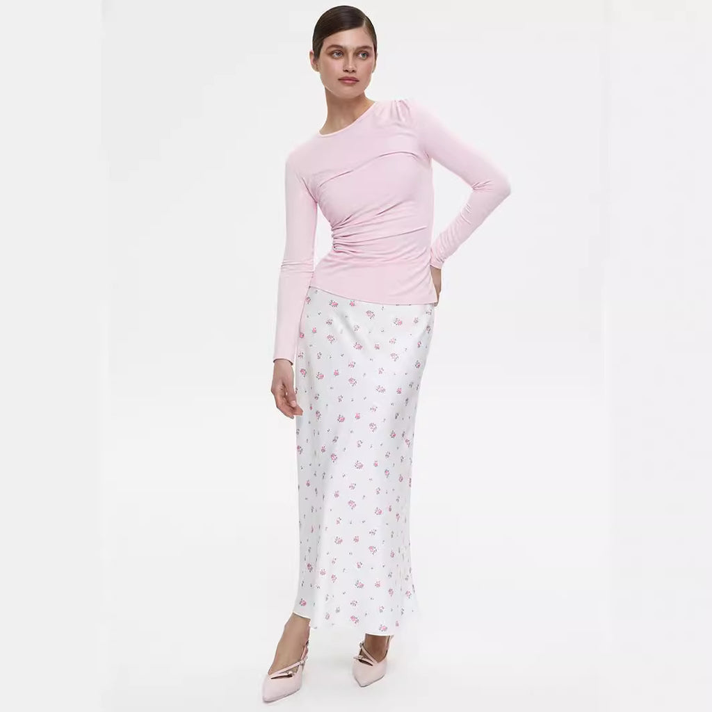 Floral Satin Maxi Skirt in White Floral — front view on model with pink top