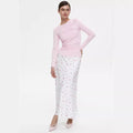 Floral Satin Maxi Skirt in White Floral — front view on model with pink top