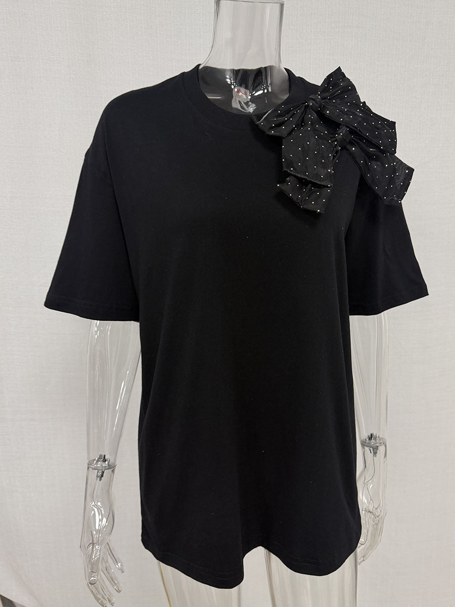 Oversized Cotton Tee with a Rhinestone Bow in Black — front view on mannequin
