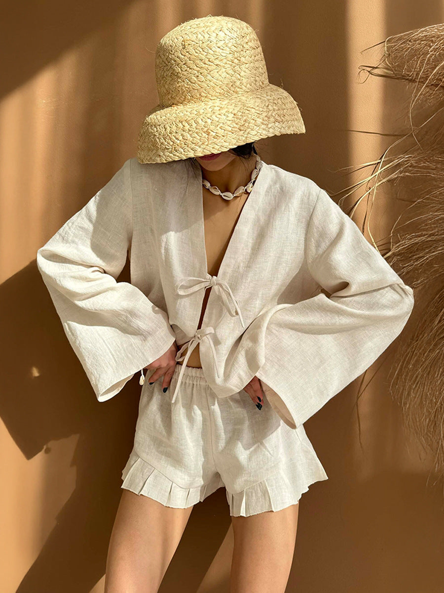 Cotton Tie-Front Top & Ruffle Shorts Set in White — outdoor view with straw hat