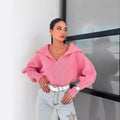Open-Collar Balloon-Sleeve Cropped Knit Sweater in Pink — front view on model