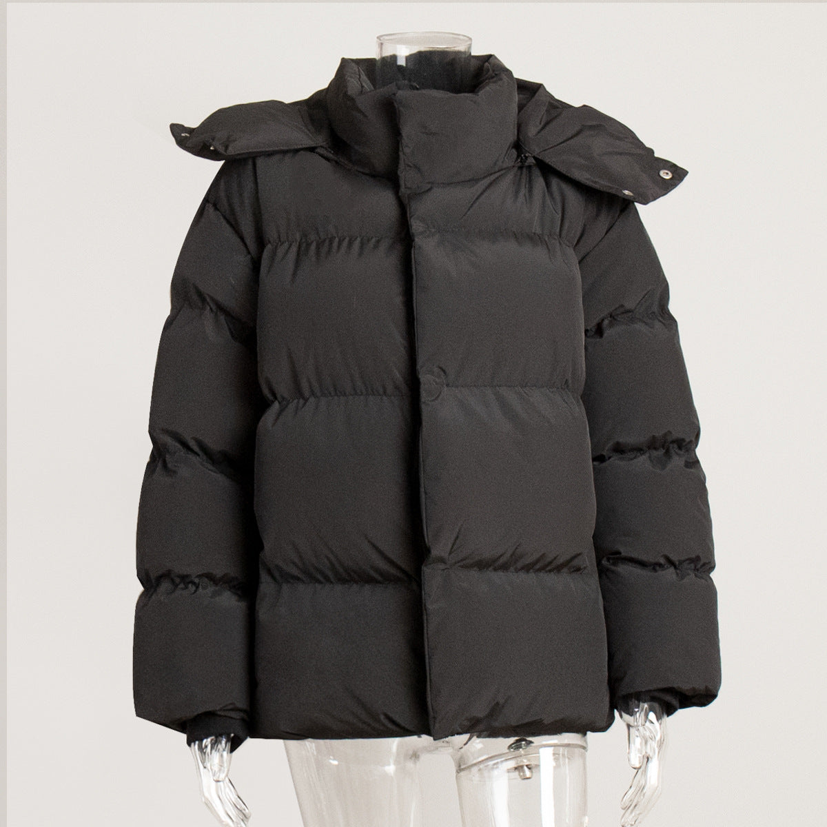 Matte Oversized Hooded Puffer Jacket in Black — front view